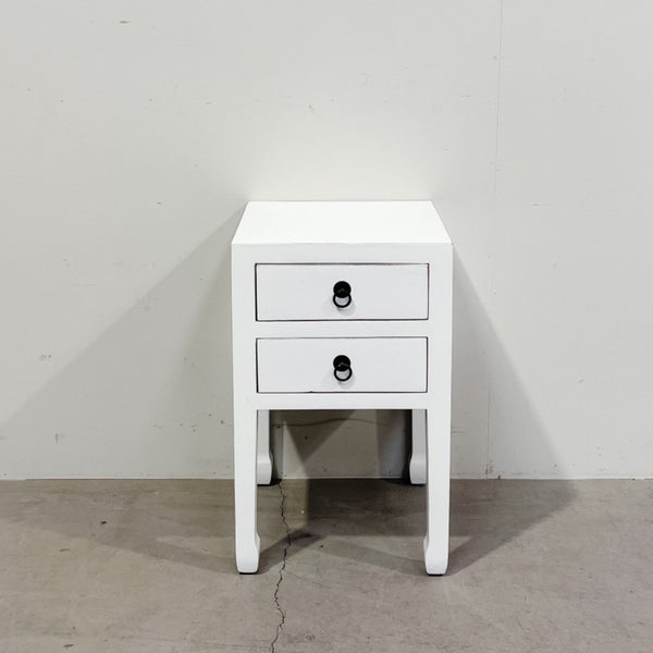 White bedside table